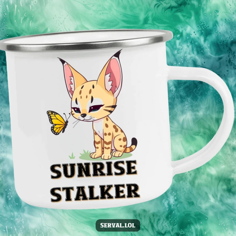 Funny camping mug of a serval stalking a colorful butterfly, perfect for outdoor excursions with a humorous twist.