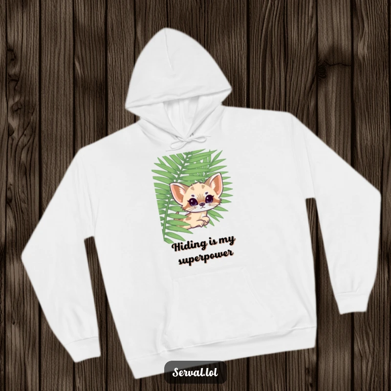 Funny kawaii serval peeking playfully from behind a vibrant green fern, a warm and humorous hoodie perfect for cozy days.
