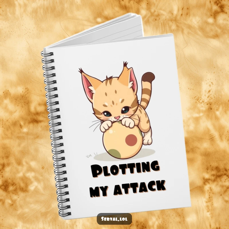 Funny Serval Pounce Notebook. A serval cat playfully pounces on a rolling ball on the cover of a lined notebook for creative notes.