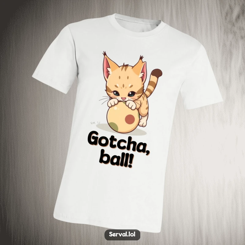 Funny Serval Pounce T-Shirt. Features a serval cat in mid-air, playfully pouncing on a rolling ball, showcasing dynamic and humorous action.
